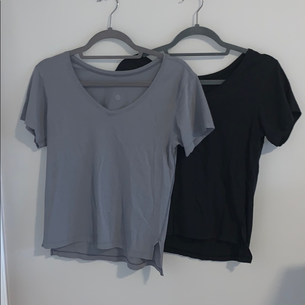 (2) short sleeve antique lululemon shirts